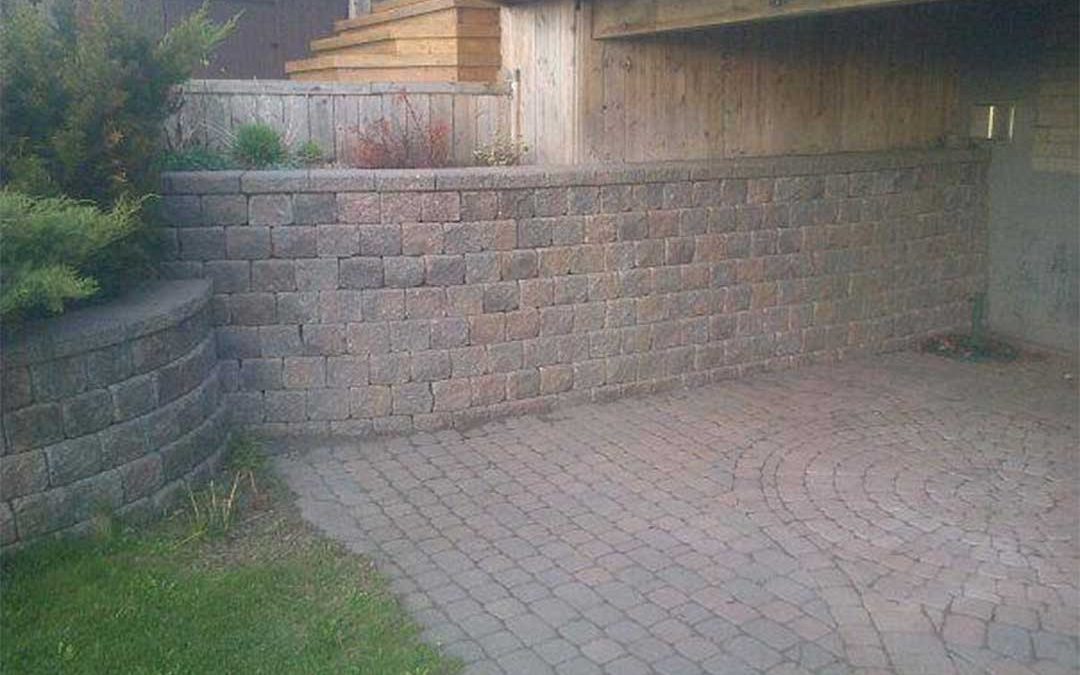 interlocking stone retaining walls and patio